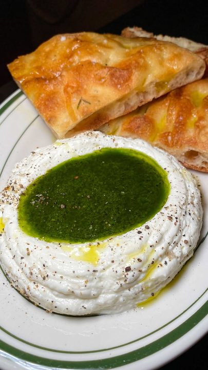 { @manerosofmulberry } chef slick’s 💋 • whipped ricotta with pesto & focaccia 😋 
•
•
•
#food #foodie #cheese #cheesy #italian #italianfood #littleitaly #nyc #newyorkcity #eats #nyceats #delicious #delish #fyp #viral #inf