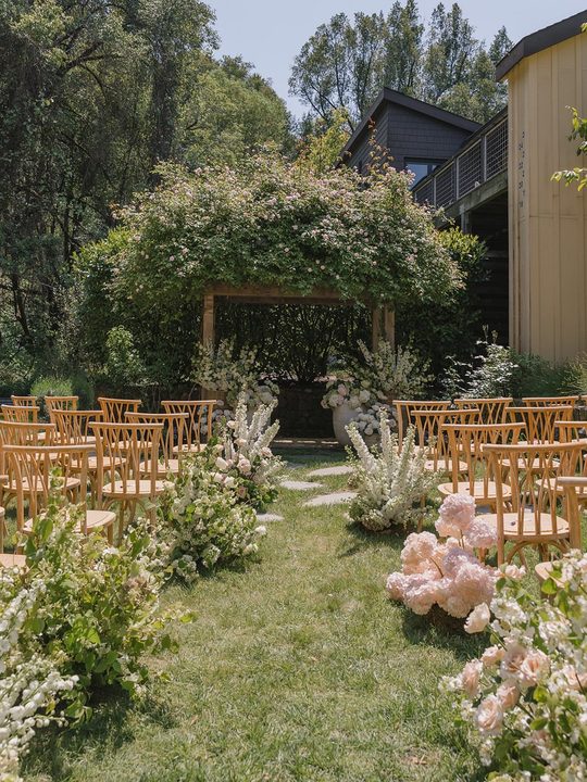 POV: you get married under a rose-covered arbor at The Farmhouse Inn.

This ceremony was designed to feel like the garden simply decided to gather around them.

Layered baskets. Stone-toned vessels. Grounded meadows spil