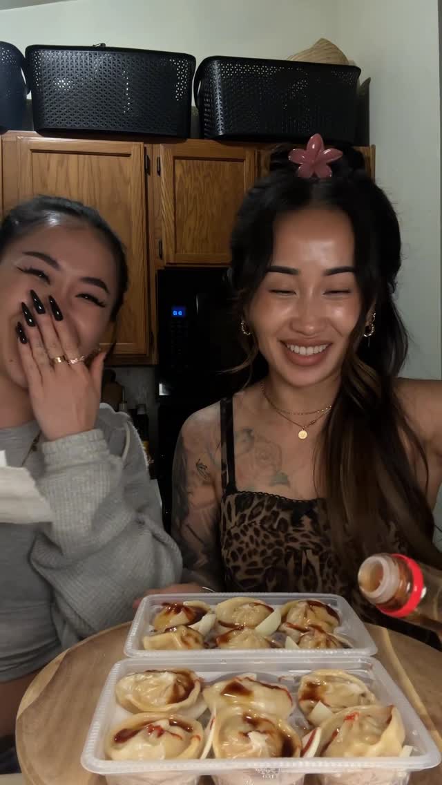 Having sis try out the viral soup dumplings.