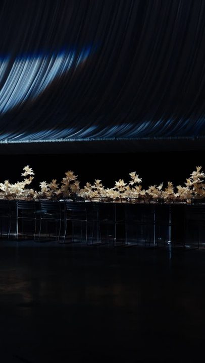 Bridal, but stripped of anything expected. A full sensory experience.

Custom-sewn ceiling draping, sculpted light, and a table that doesn’t break for 80 feet. Thousands of Casablanca lilies sitting on beds of moss - cle