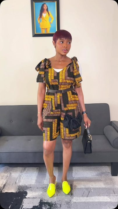 Church picnic fit ❤️. With the belt or without?

Play suit @zikorahafrica 
Mules @beautiisoles 
Bag @claireciel_style 

#summer2026 #africanprints #fashionablybukky #madeinnigeria #fashioncontentcreator