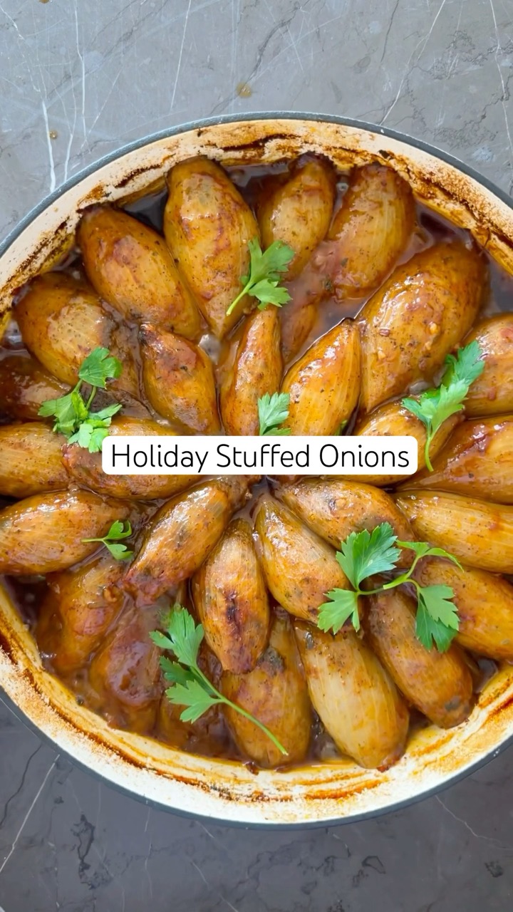 Full recipe pinned in comments and also on Sivanskitchen.com. #sivanskitchen #stuffedonion #holiday