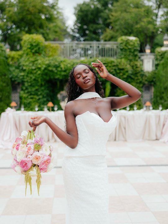When deciding which details were most important to us, we knew that the florals, dress, and table decor would set the tone for the entire shoot. We dressed @esezao in a beaded, two-piece couture gown from @fantasybridalu