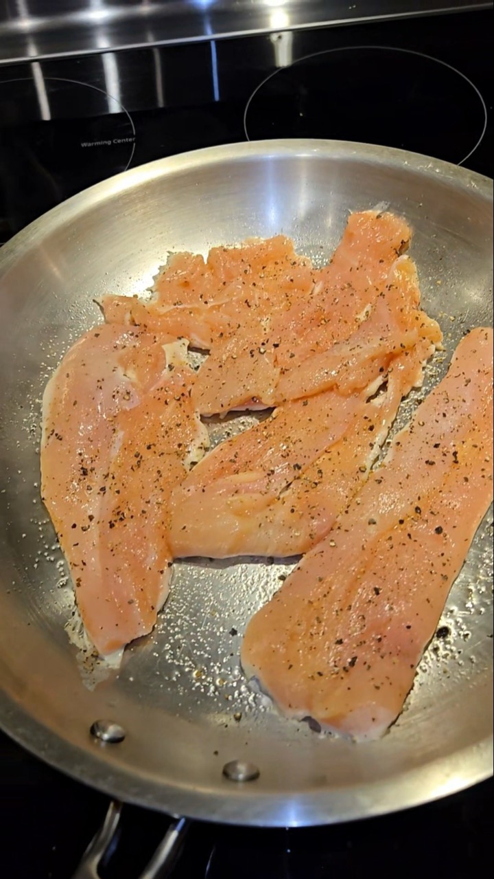 Homemade Chicken Alfredo in 1 stainless steel pan