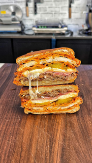 Cuban Stinger. A combination of a Cuban Sandwich, and a Buffalo Stinger.

INGREDIENTS
(makes 2)
2 pounds boneless pork shoulder
2 cups Mojo 