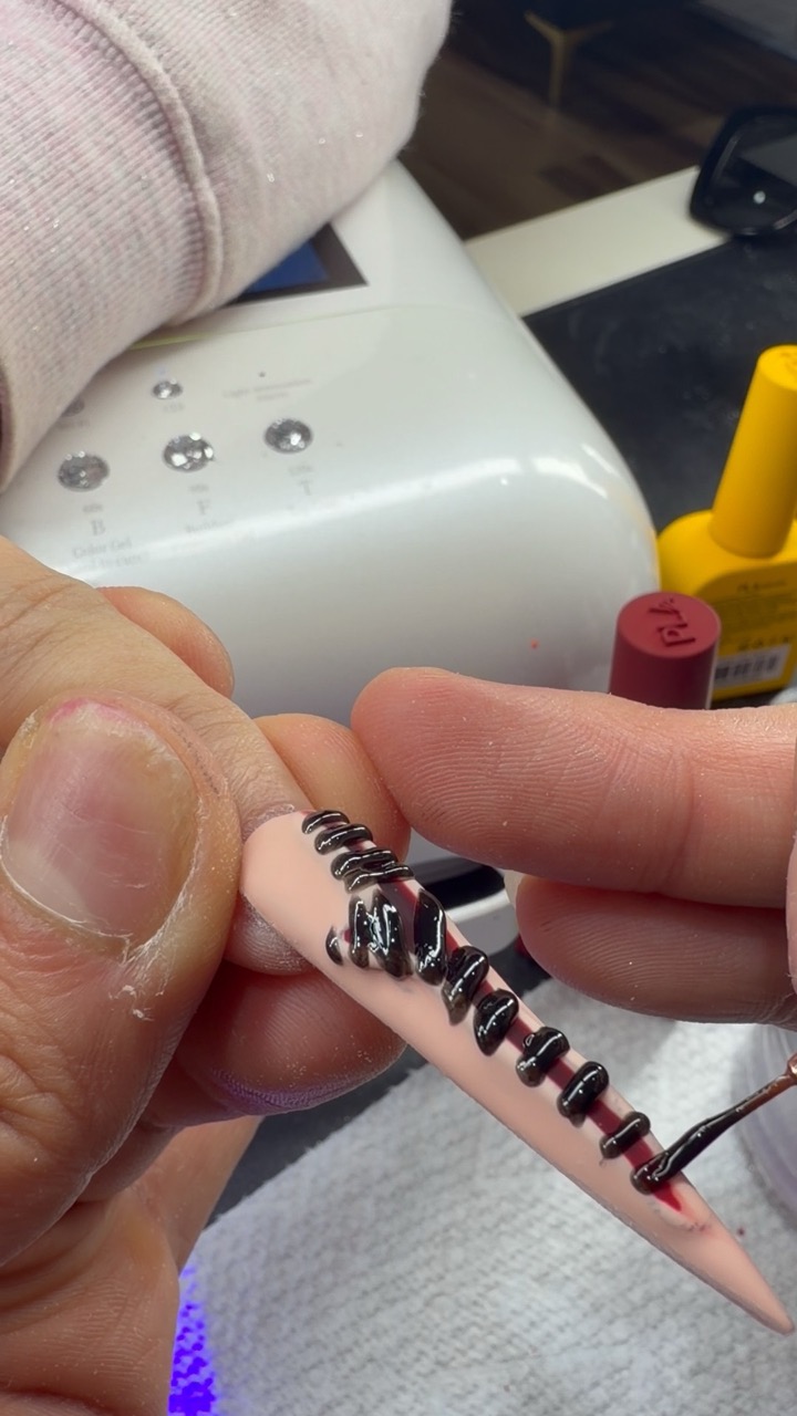 Halloween nails on Shanon.