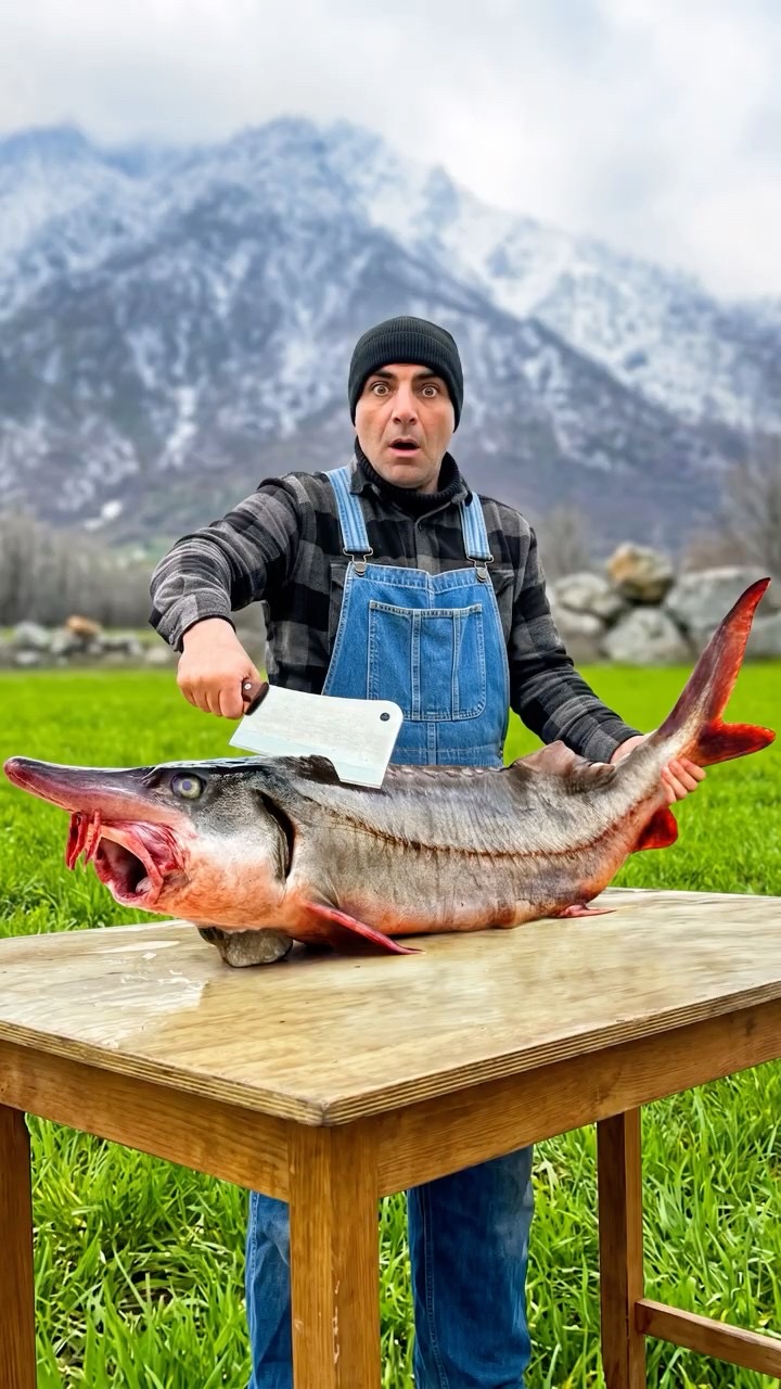 Whole Beluga Cooked Over a Campfire
